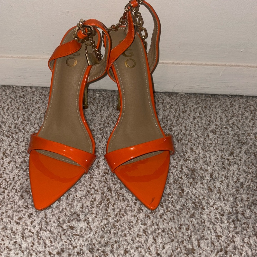 Stunning Orange & Gold heel Strap sandals worn on for an event. Very classy!